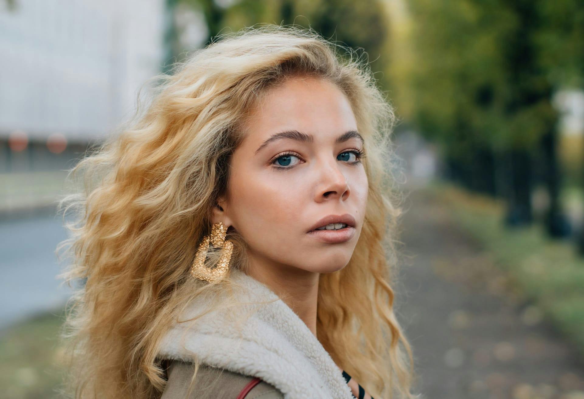 Woman with curly blonde hair