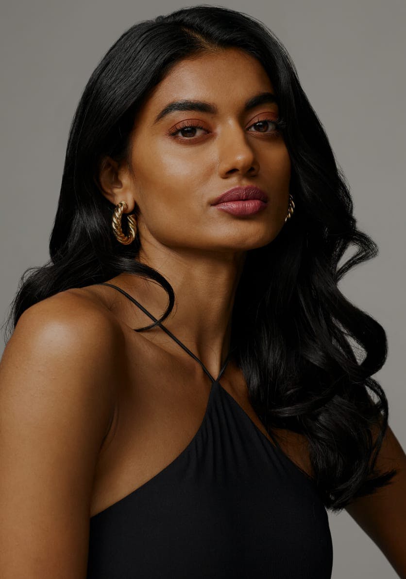 woman with dark curly hair