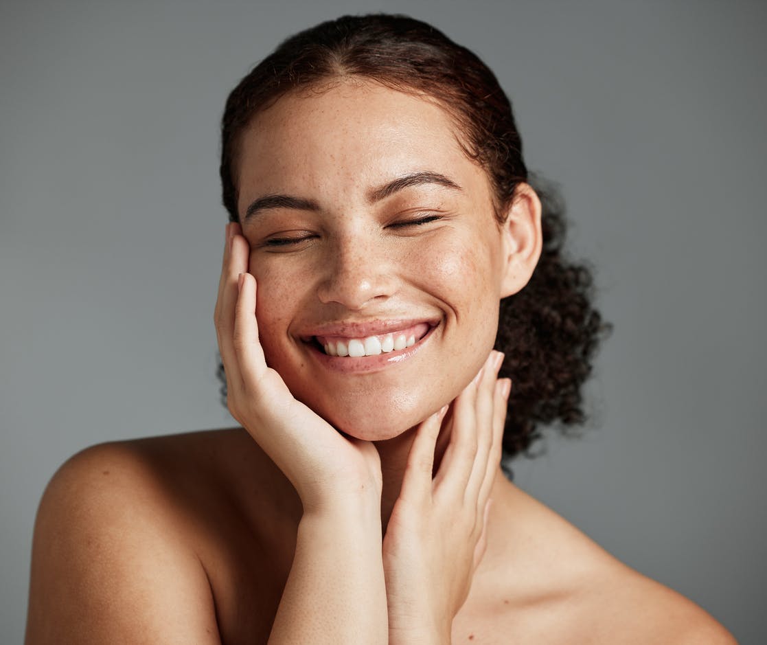 Woman with her hands on her face