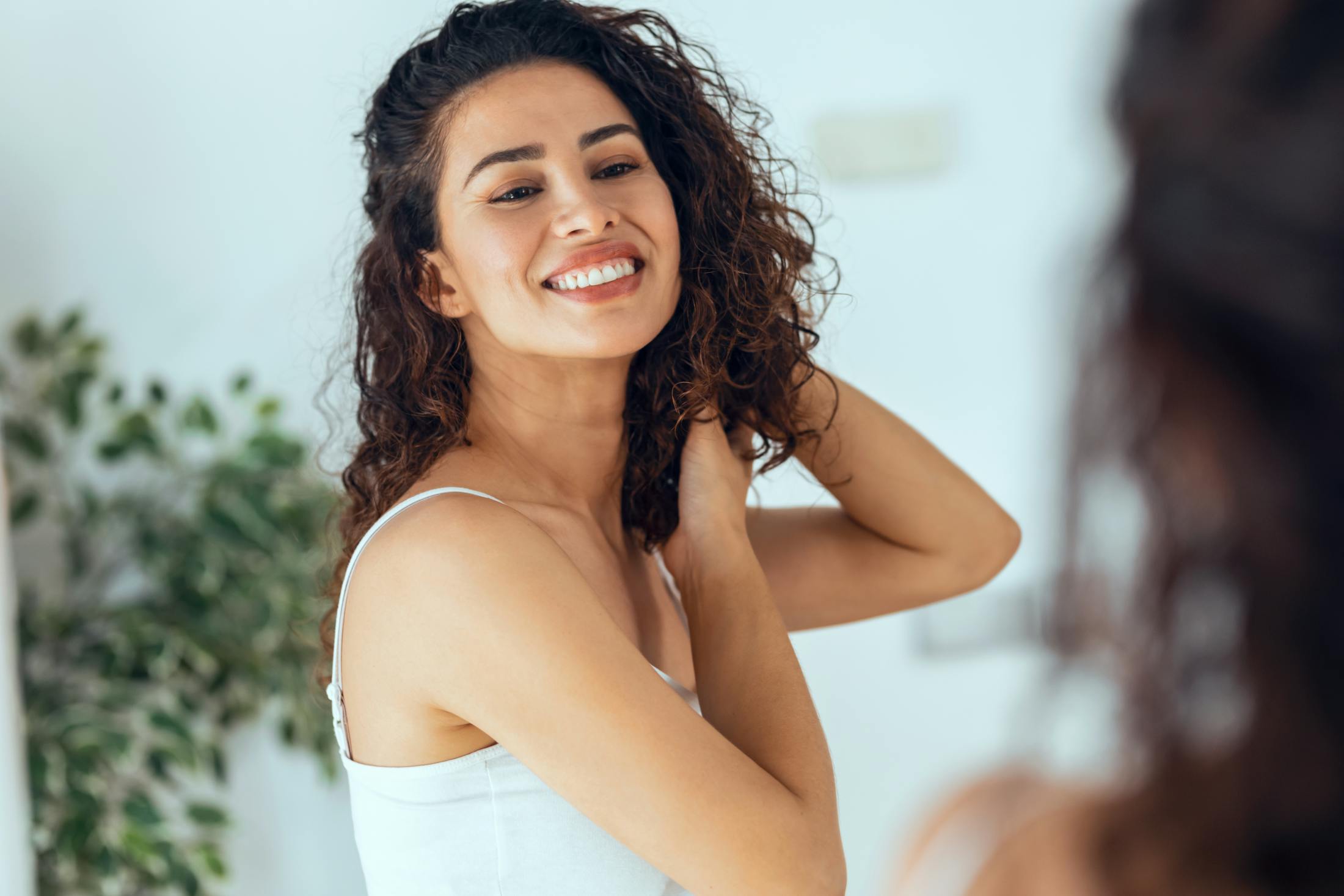 Woman smiling with bright clear skin.