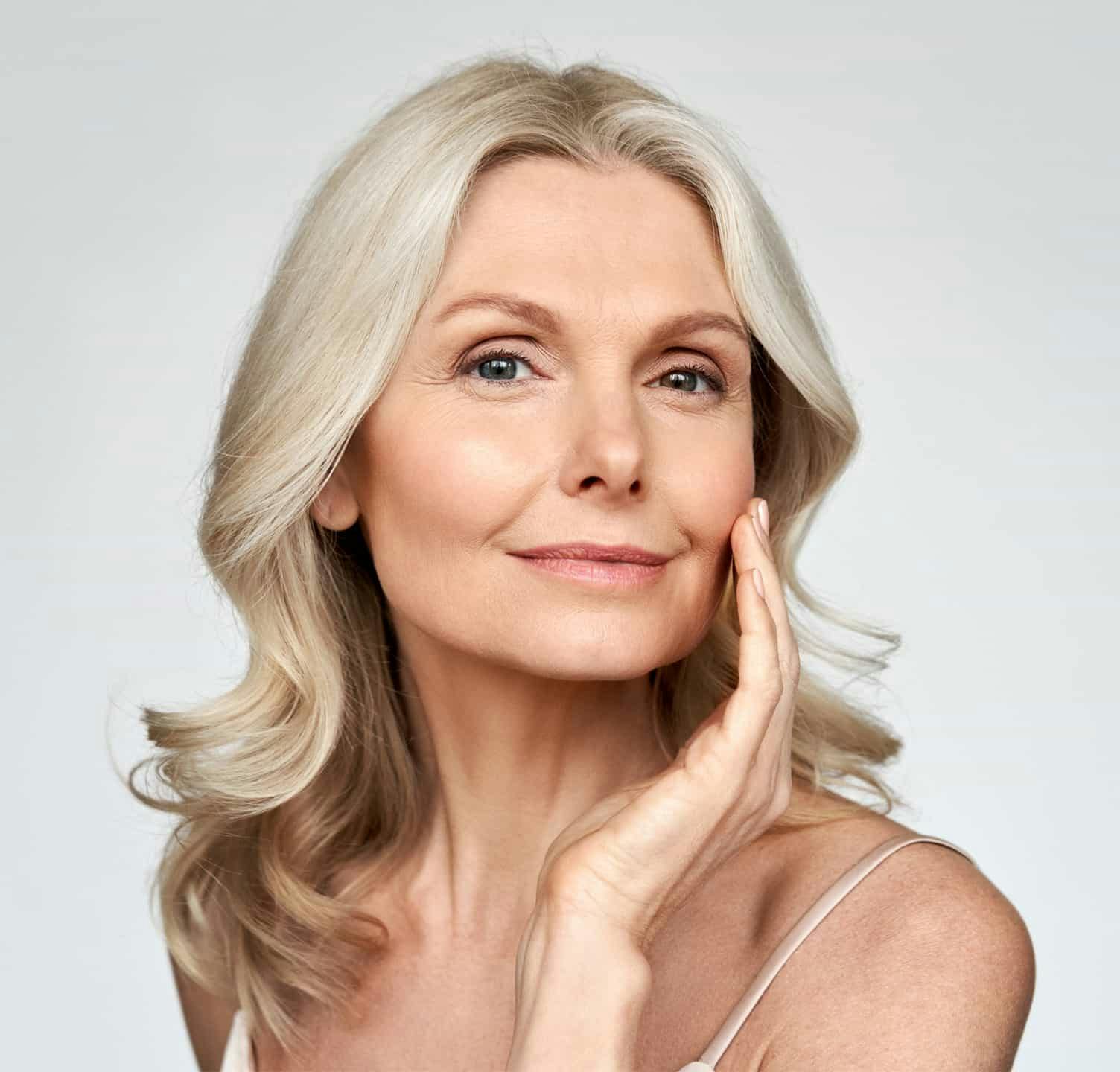 woman with curly grey/blonde hair