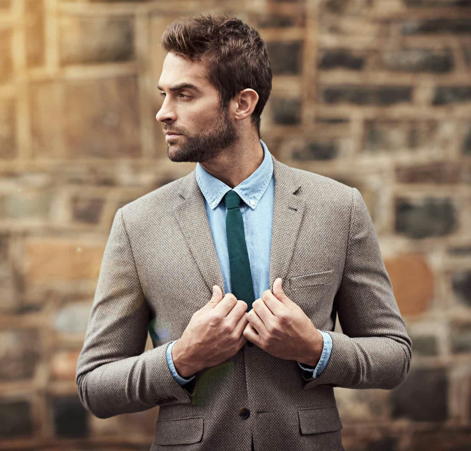 Man wearing a suit looking to the side