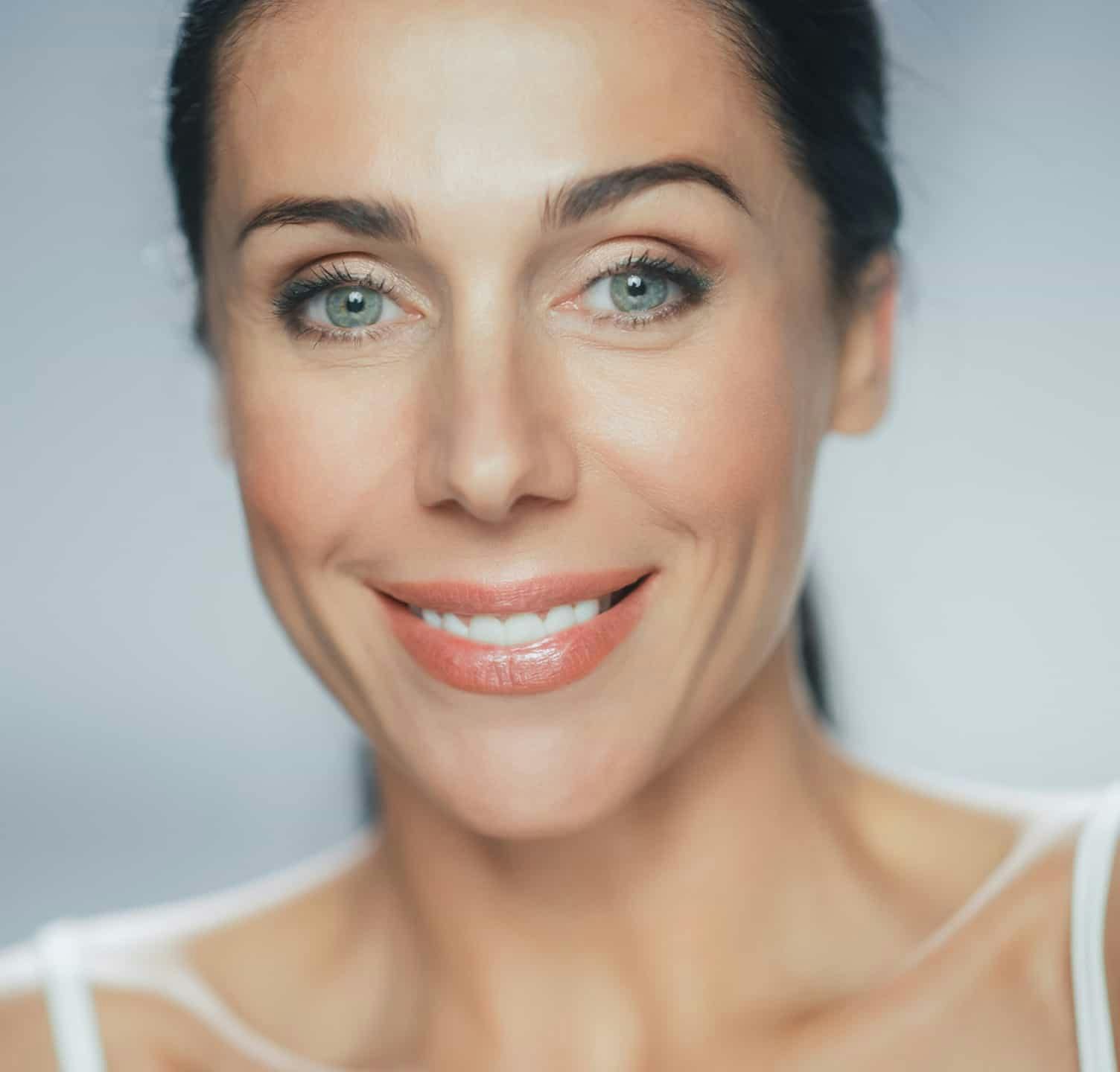 Woman with blue eyes smiling