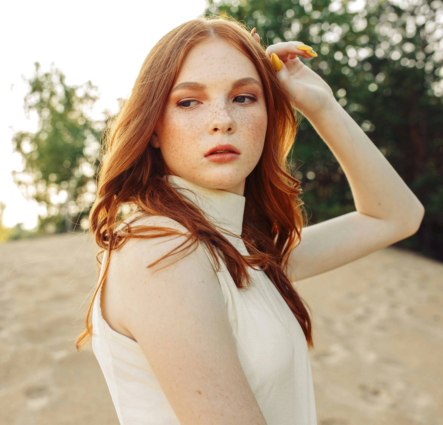 woman with red hair and freckles
