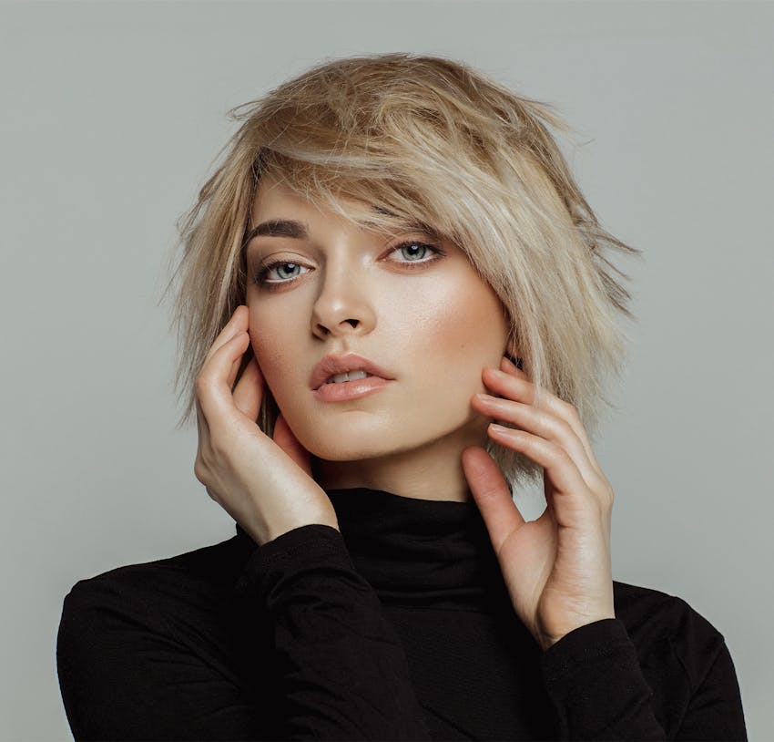 Woman wearing a black top smiling