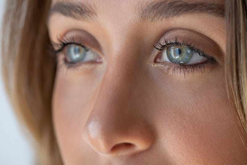 Woman with beatiful blue eyes and nose