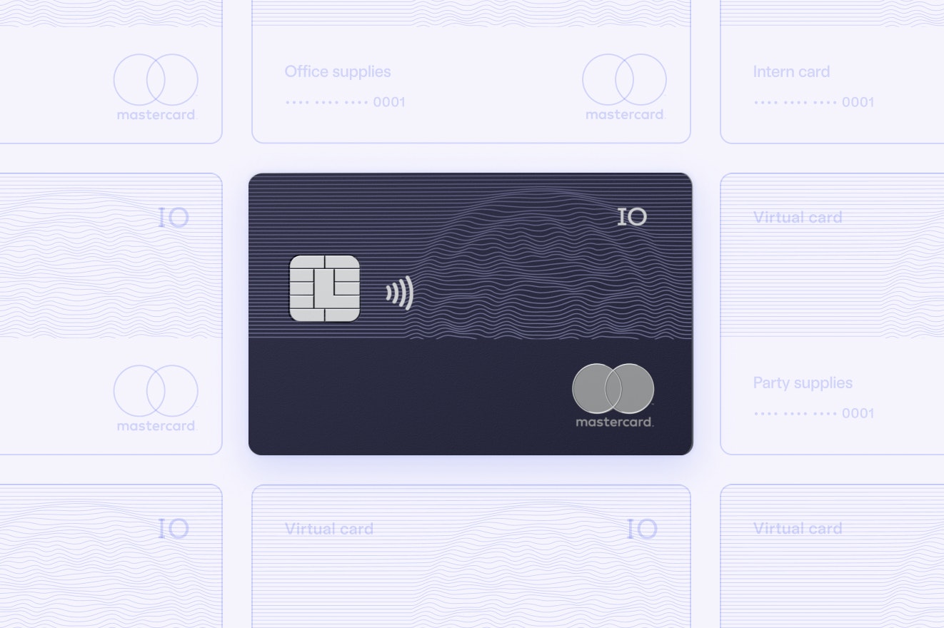 Image showing a real credit card alongside several illustrated credit card designs.