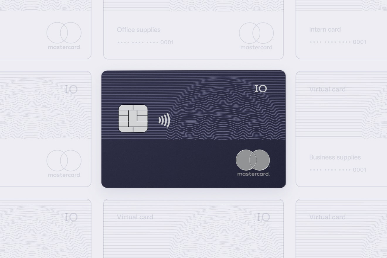 The IO credit card at the center surrounded by a grid of named virtual cards with specific use cases (ex. lunch card, office supplies, etc.)
