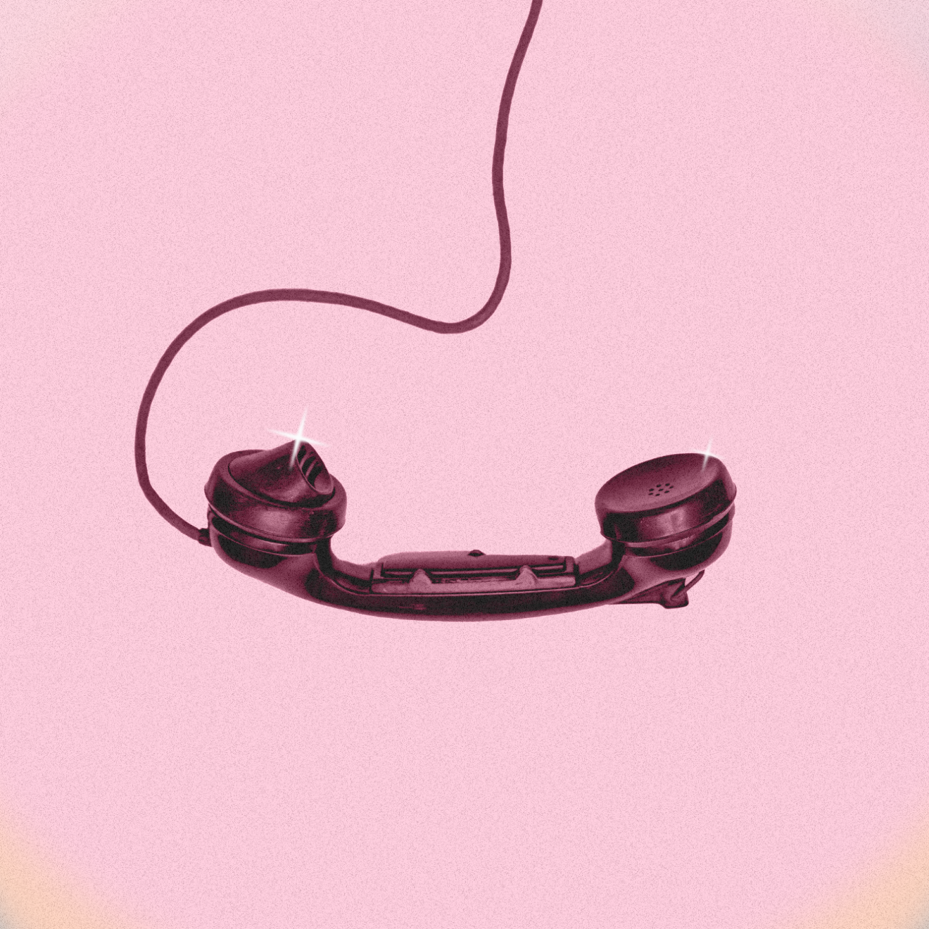 A black analog telephone in a pink and blue spotlight A black analog telephone in a pink and blue spotlight