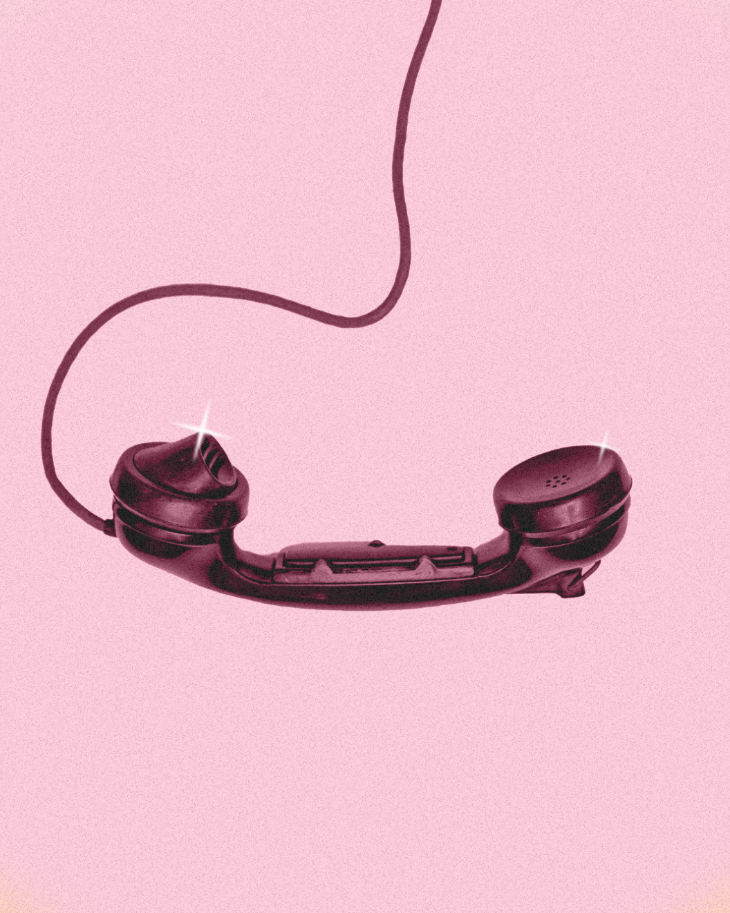 A black analog telephone in a pink and blue spotlight A black analog telephone in a pink and blue spotlight