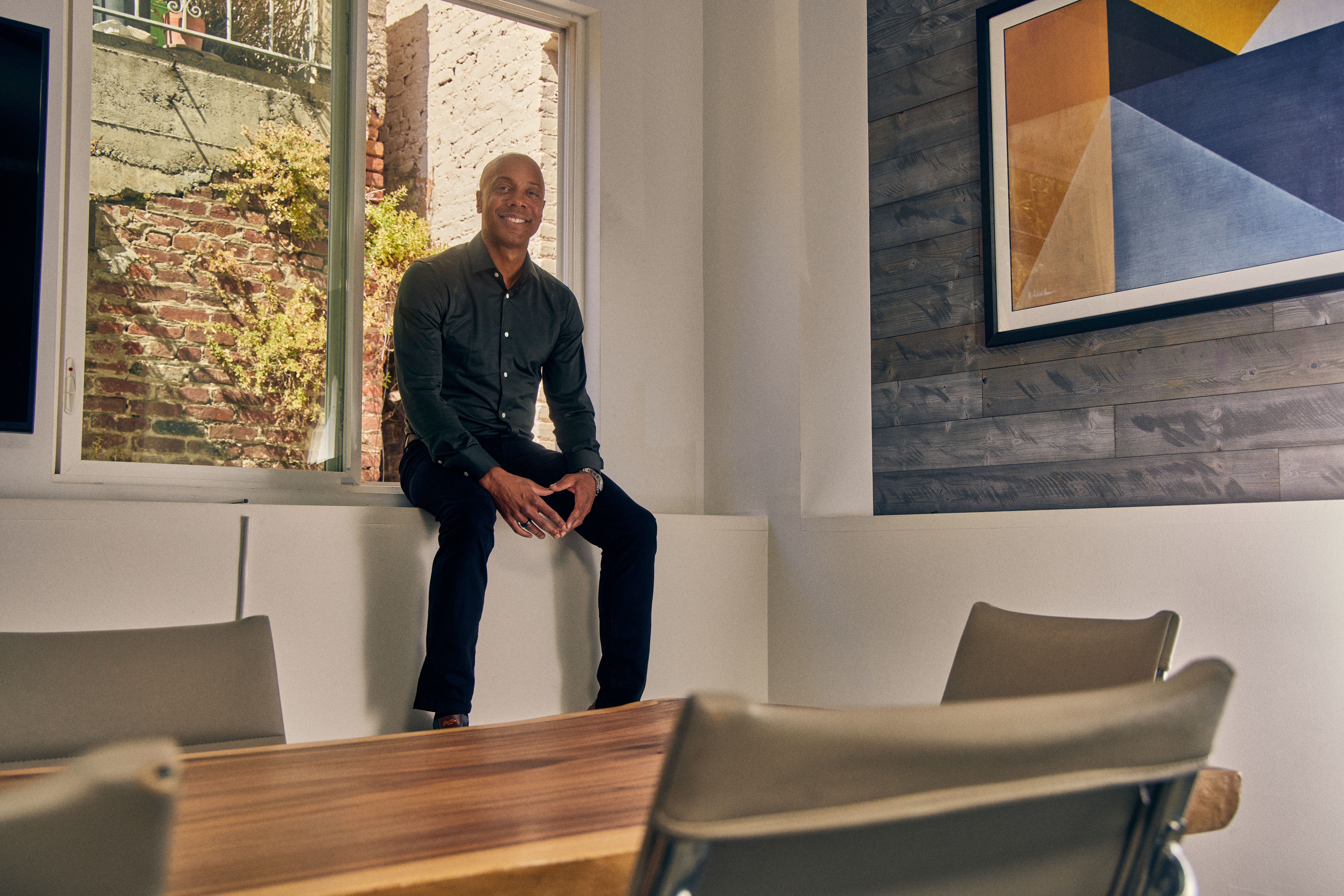 Charles Hudson in a conference room