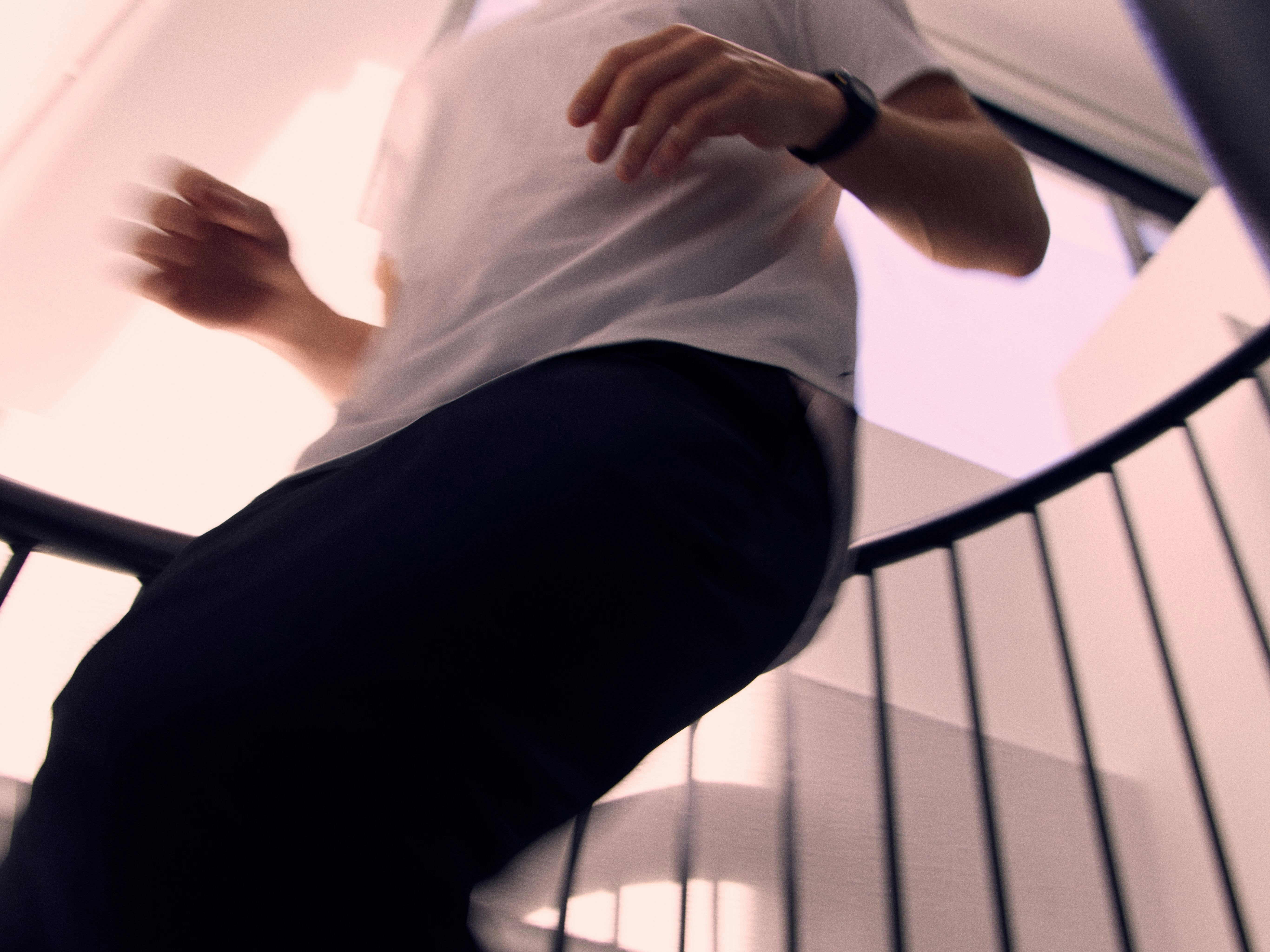 Photograph of Ryan Hoover running down the stairs | Derek Yarra for Meridian Photograph of Ryan Hoover running down the stairs | Derek Yarra for Meridian