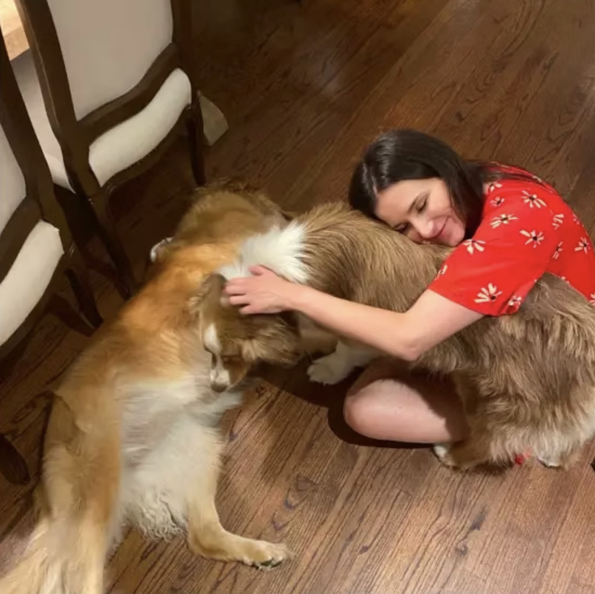 Veronica cuddling with some dogs!