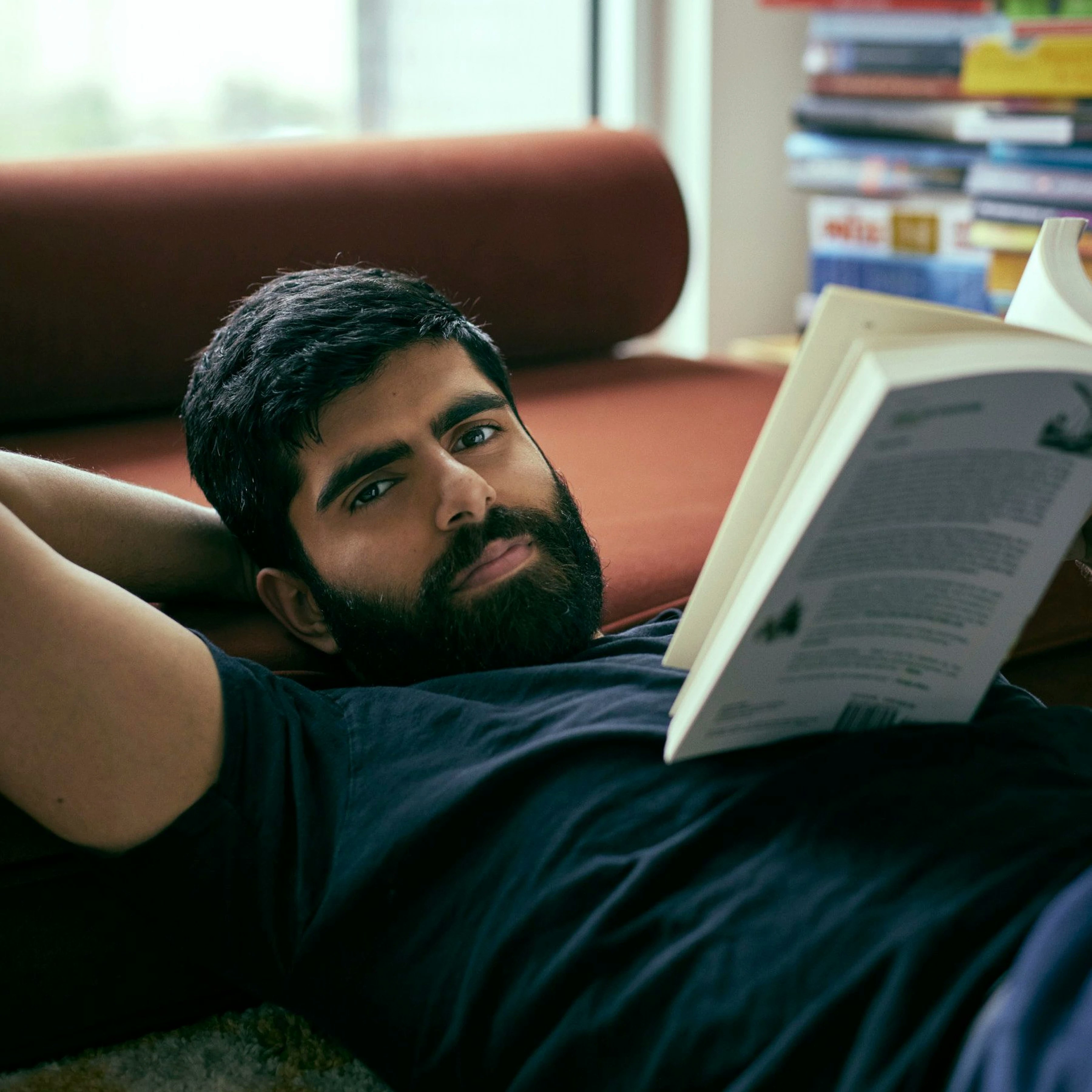 Photography of Dwarkesh Patel reading