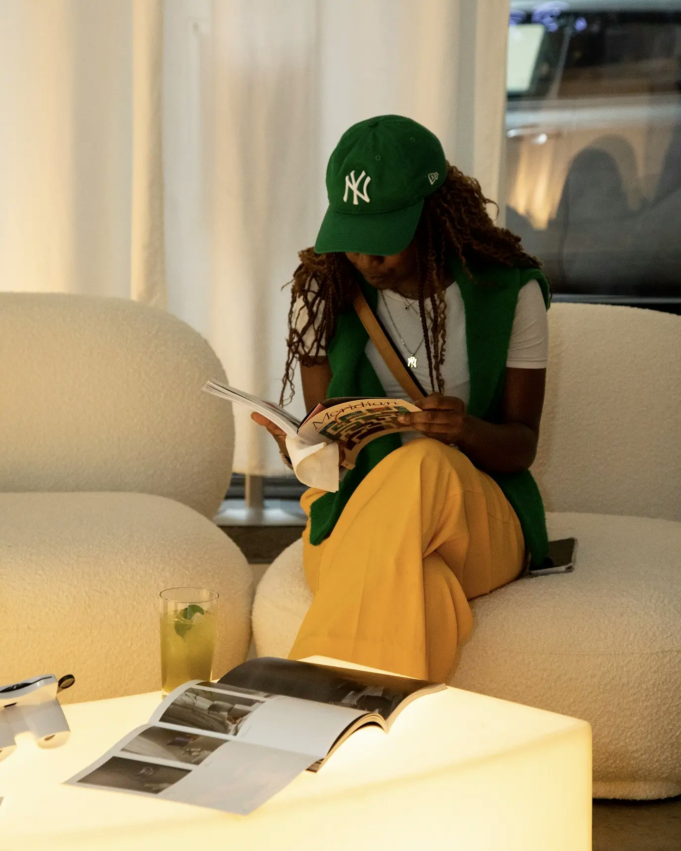 Meridian event attendee reading the magazine