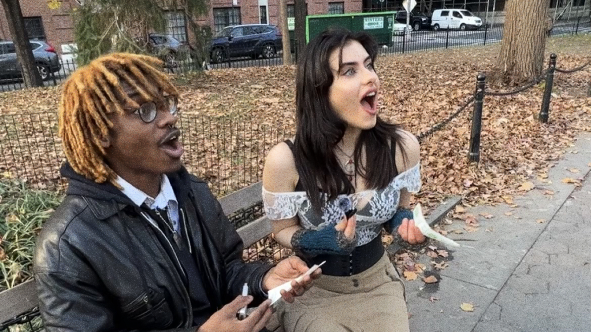 Poetry Camera testers receiving their poem in Washington Square Park