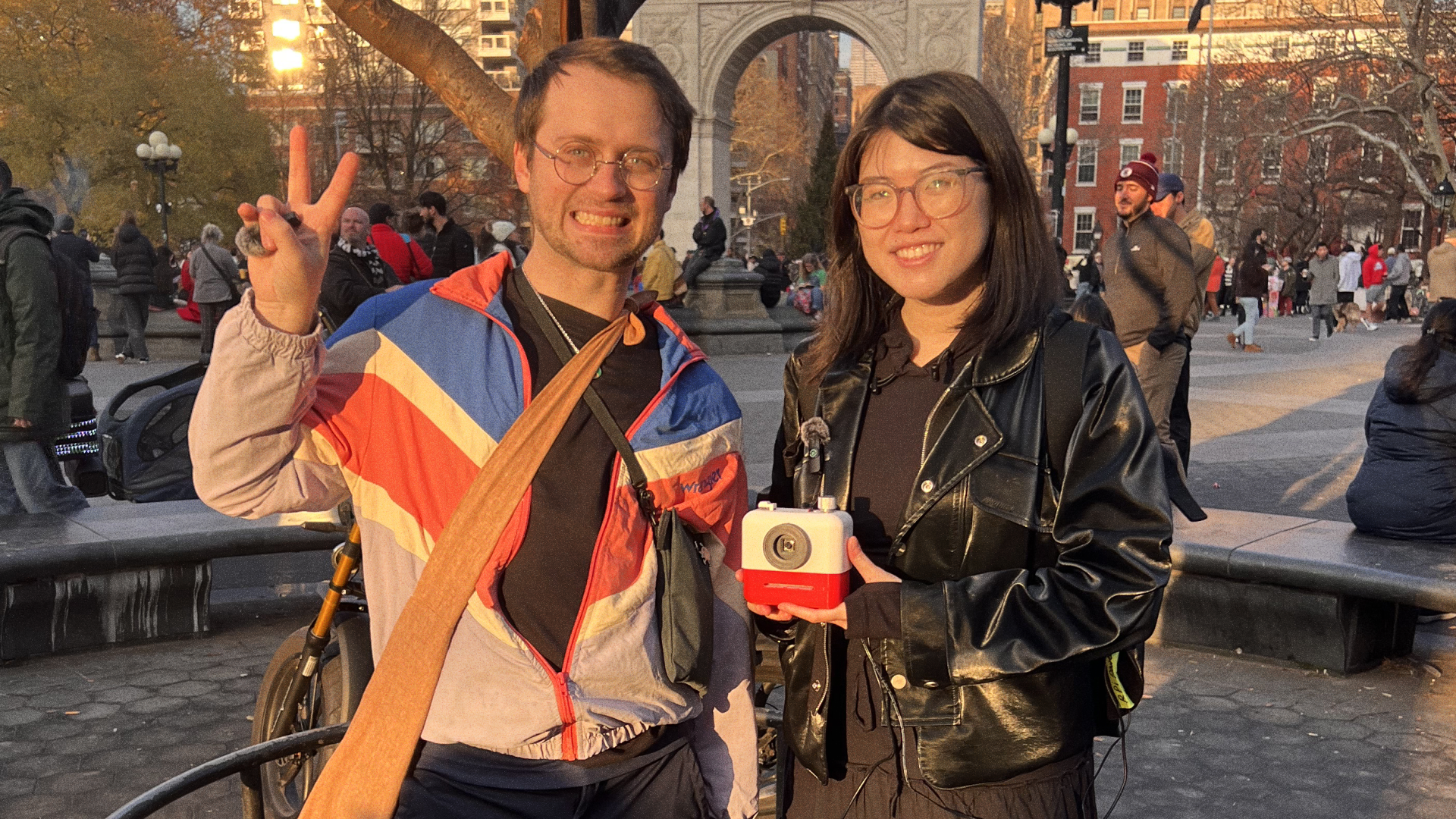 Zhang and Mather with their Poetry Camera prototype in Washington Square Park