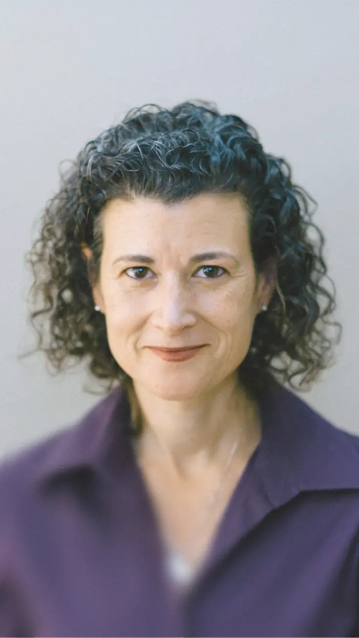 Portrait of a woman indoors next to a testimonial about Mercury’s built-in permissions.