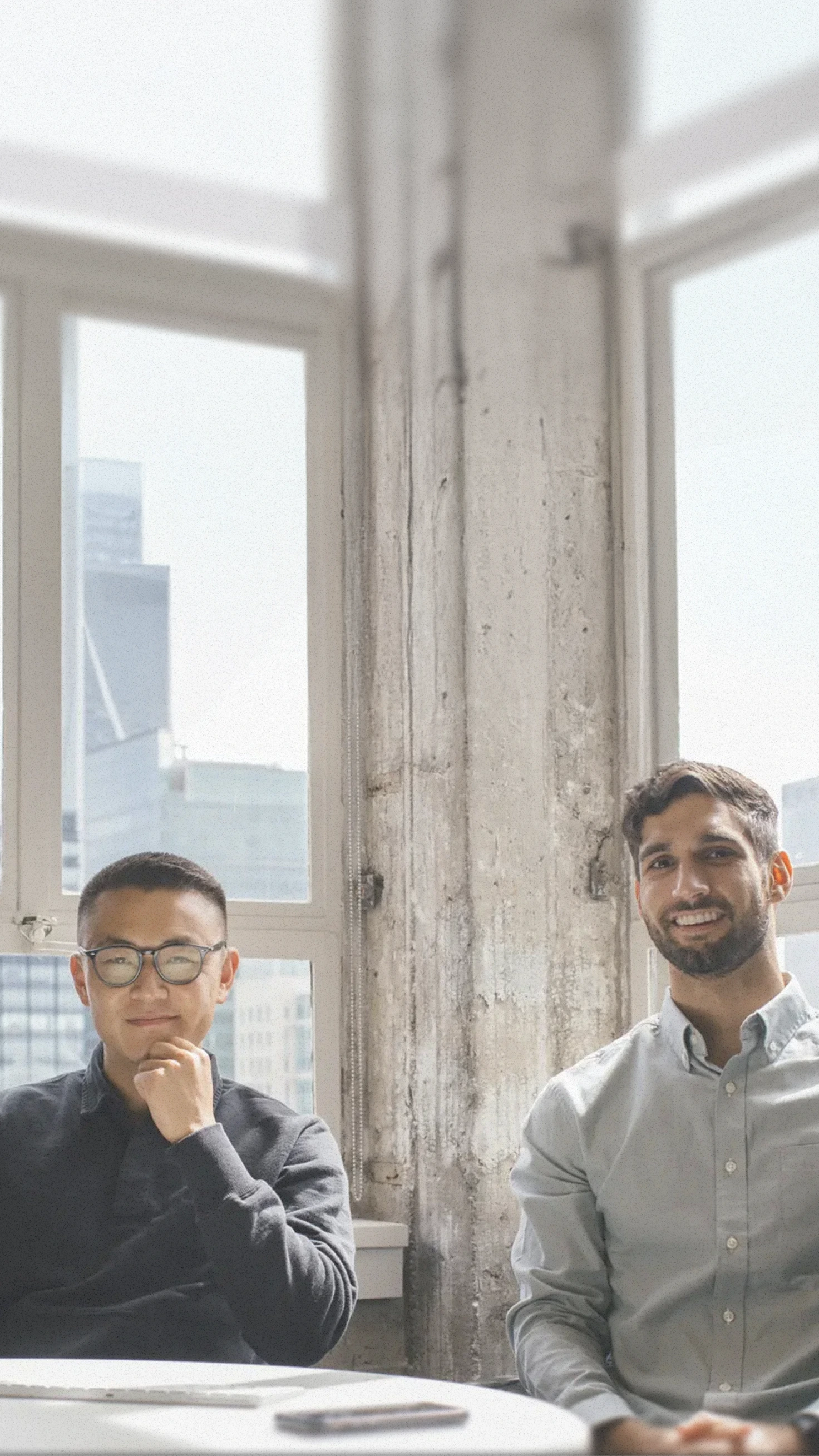 Portrait of two founders next to a testimonial about how Mercury keeps pace with company-building.