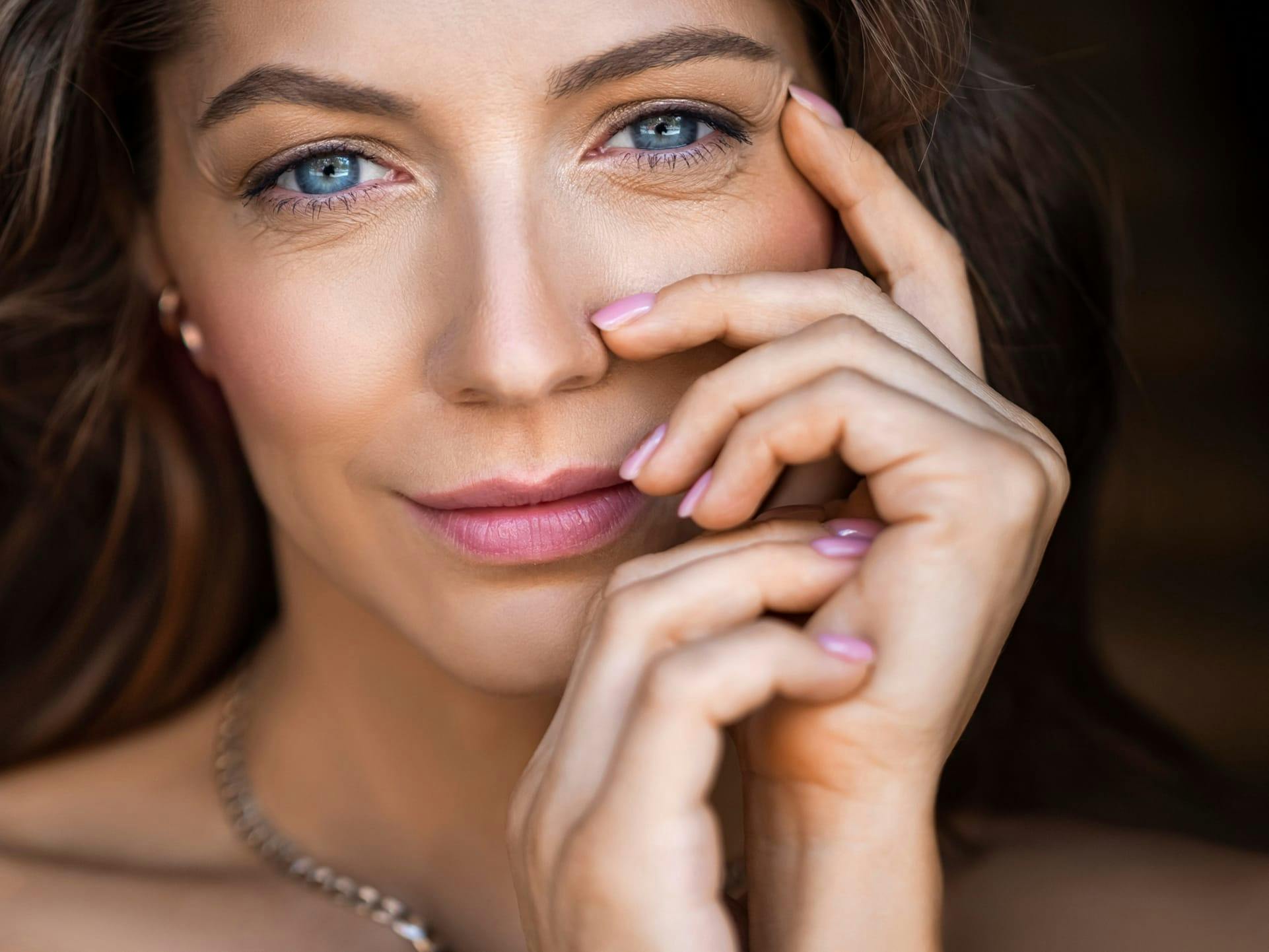 touching face