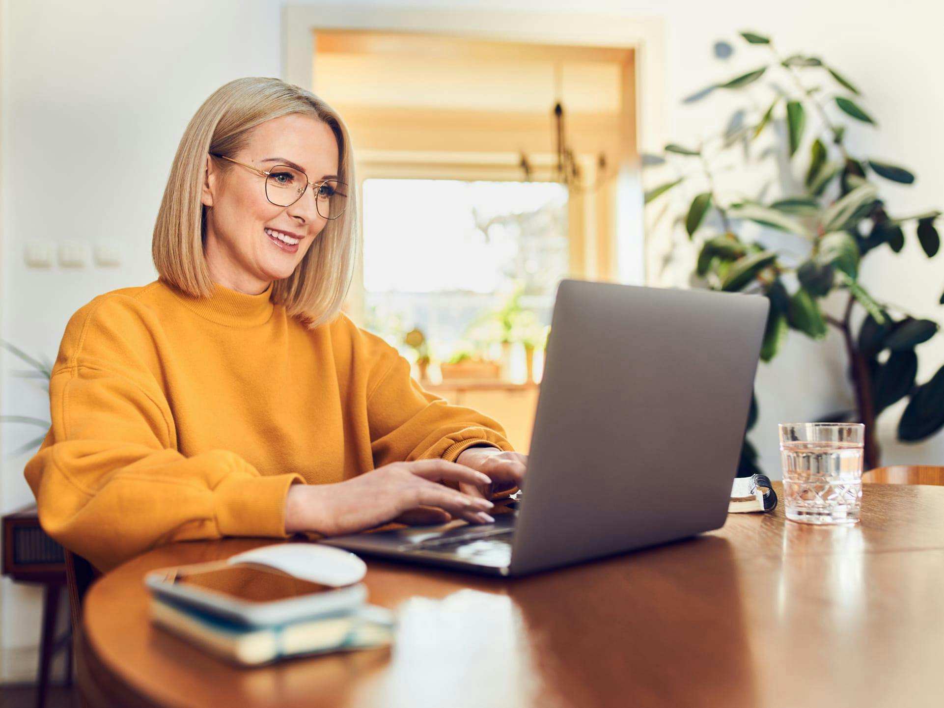 sitting on computer