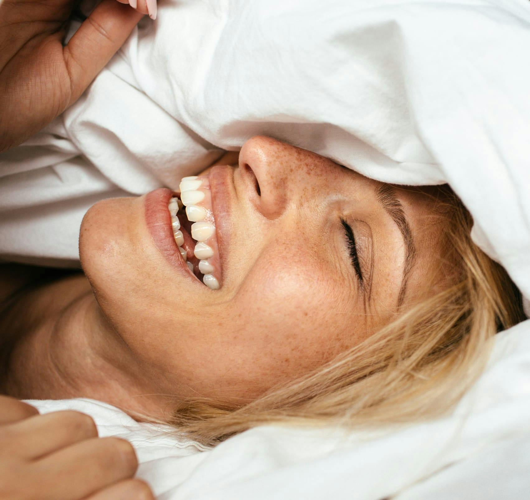 smiling in bed