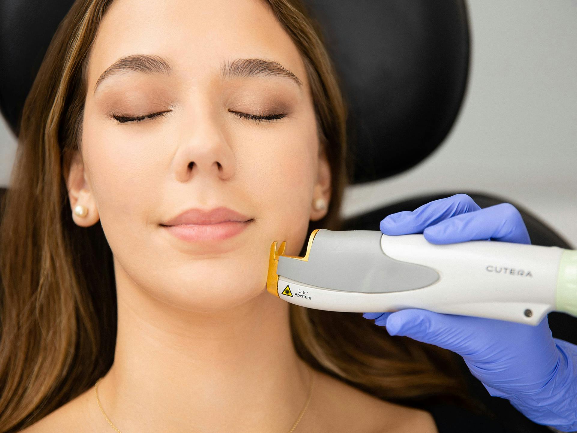 woman getting skin treatment