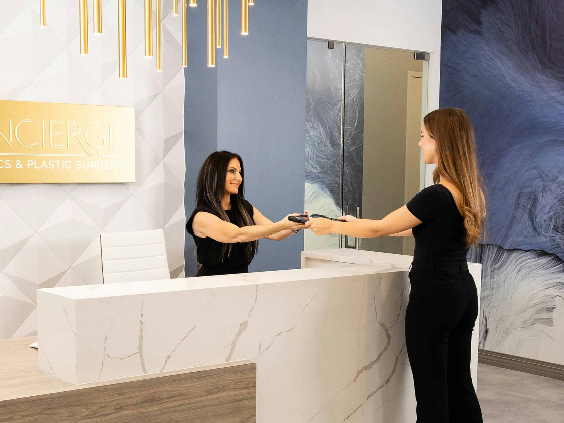 receptionist greeting client