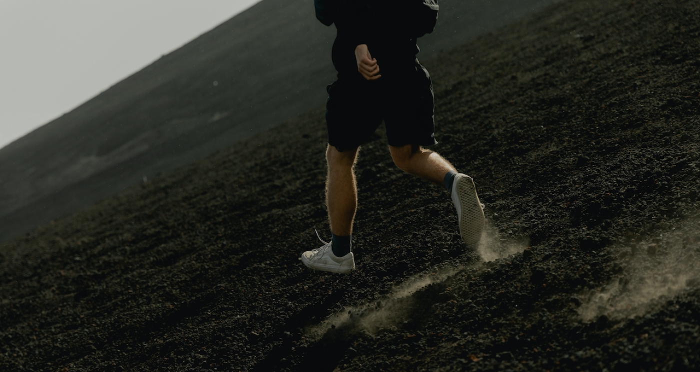 Person hiking across a mountain