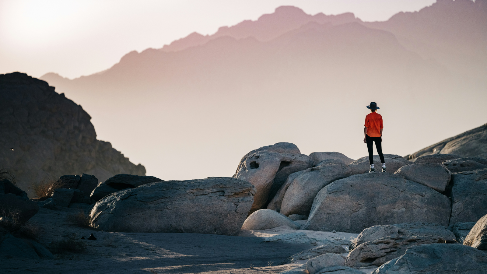 Woman hiking at sunset