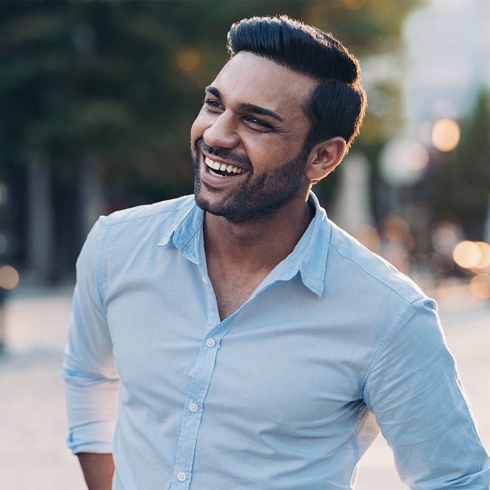 smiling, satisfied MagnYm patient