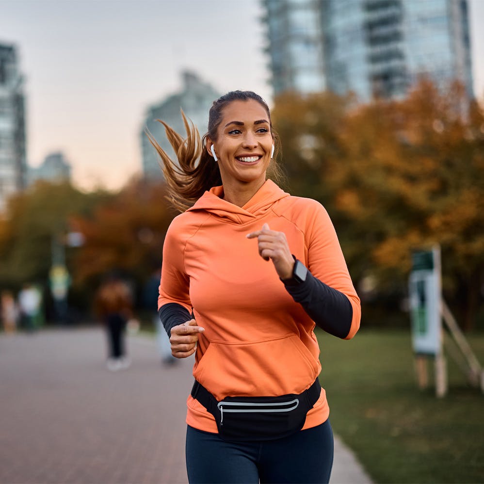woman jogging in a city park