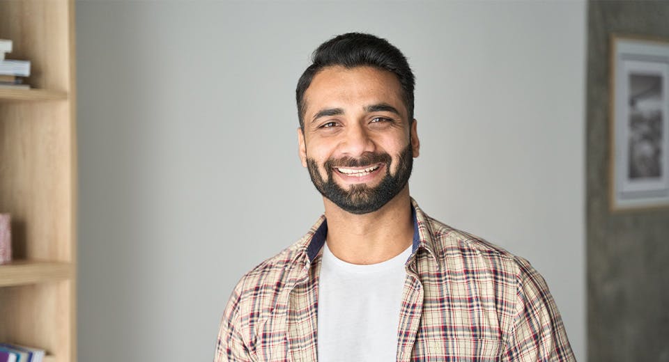 Smiling man who received MagnYm treatment