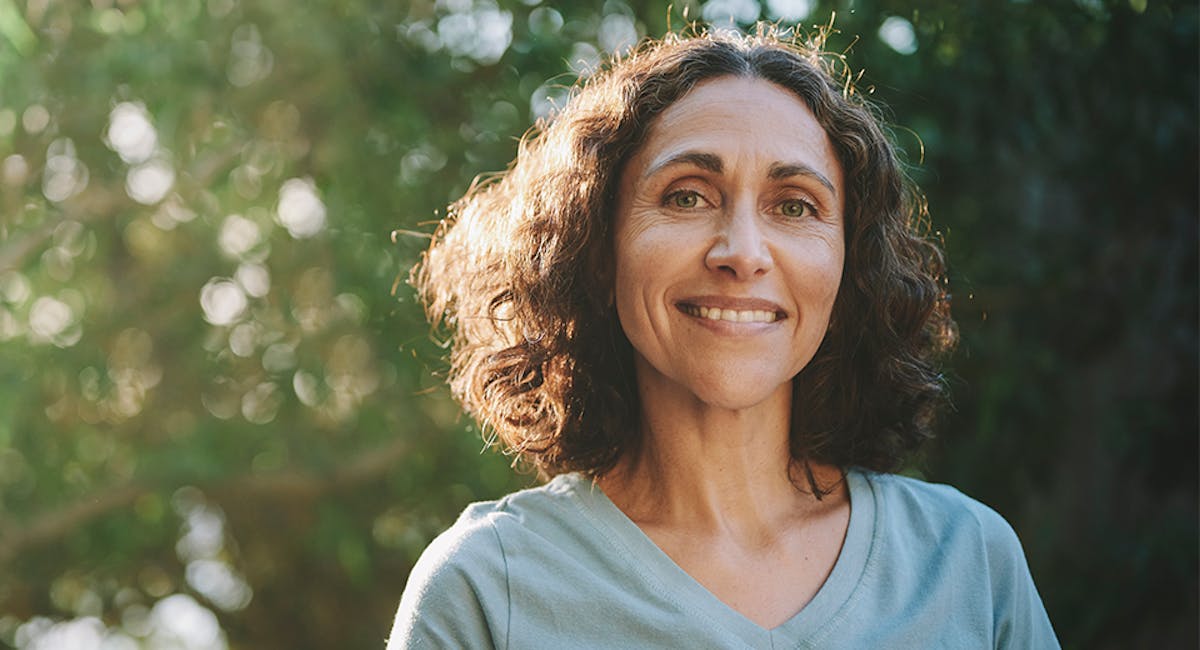 man standing at a bayside window