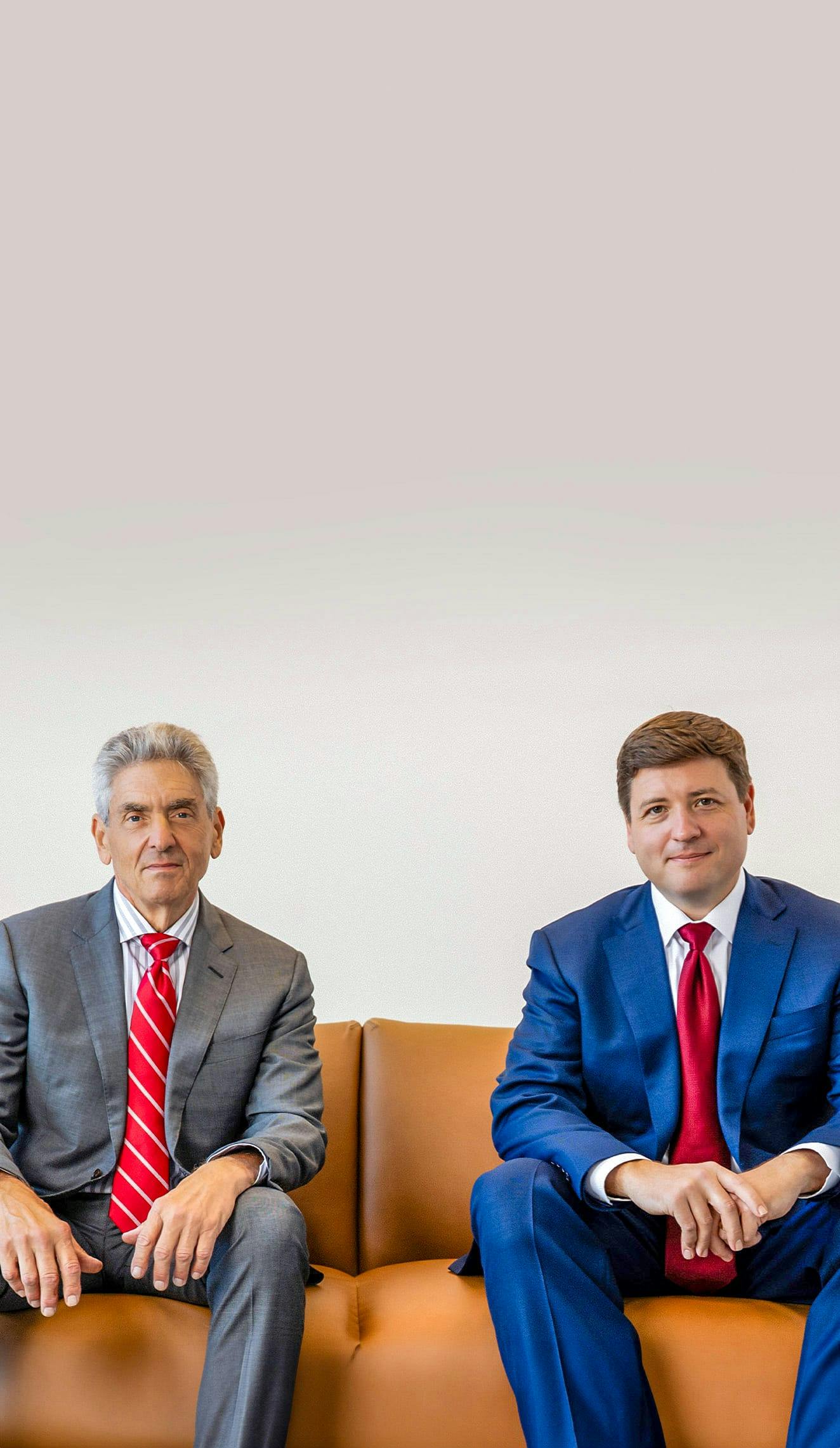 Kevin Camp and John Roven on a couch