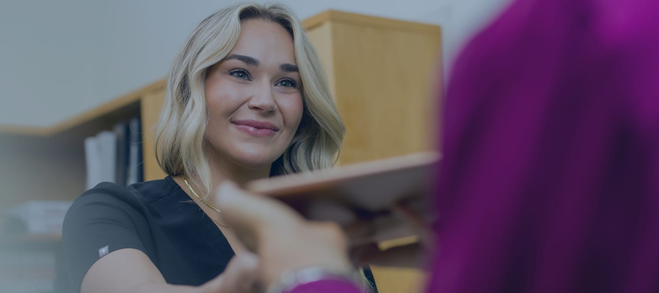 blonde woman smiling