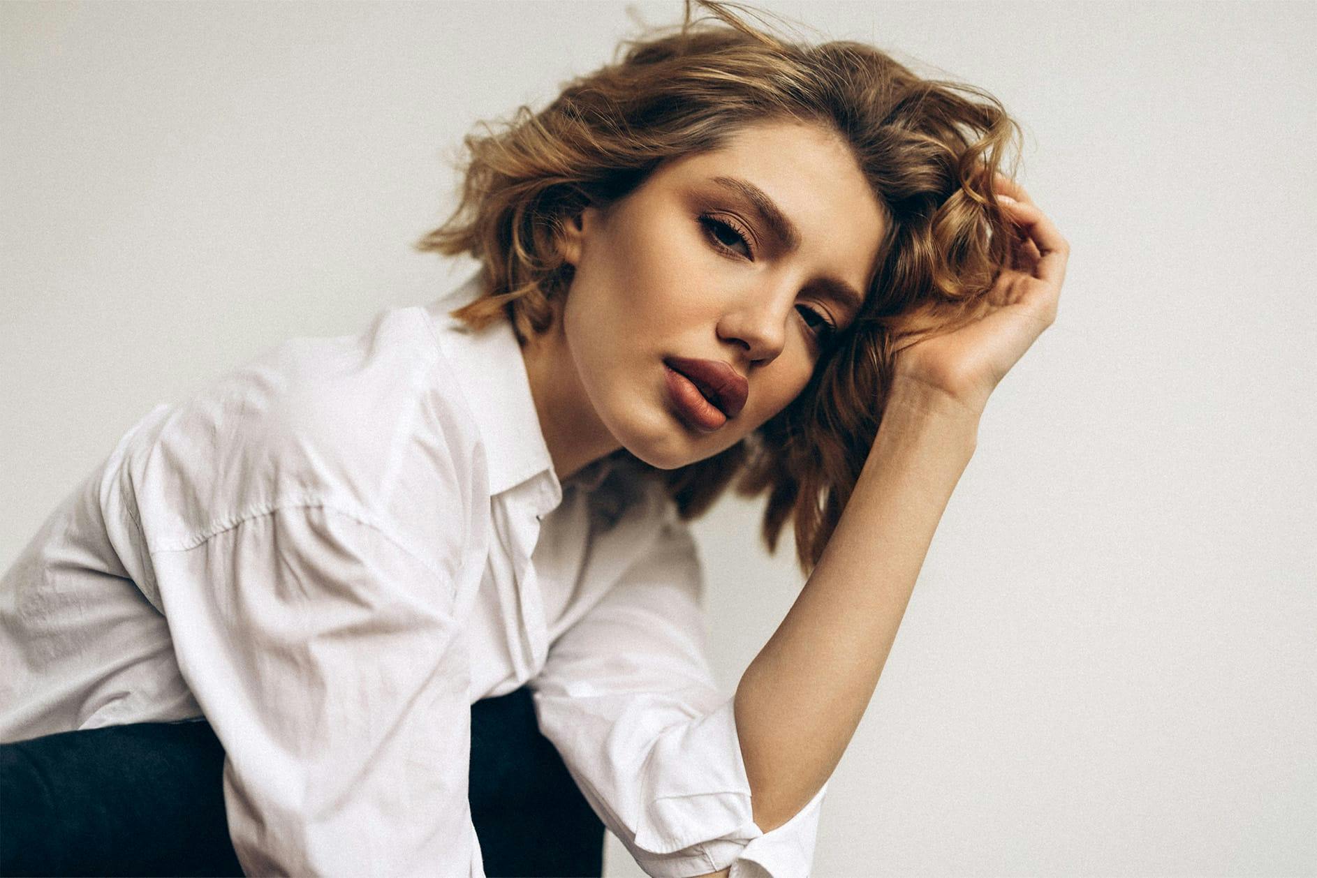 Woman in white blouse