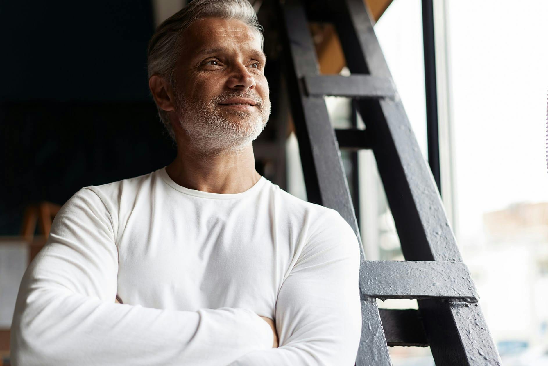Bearded man in white shirt