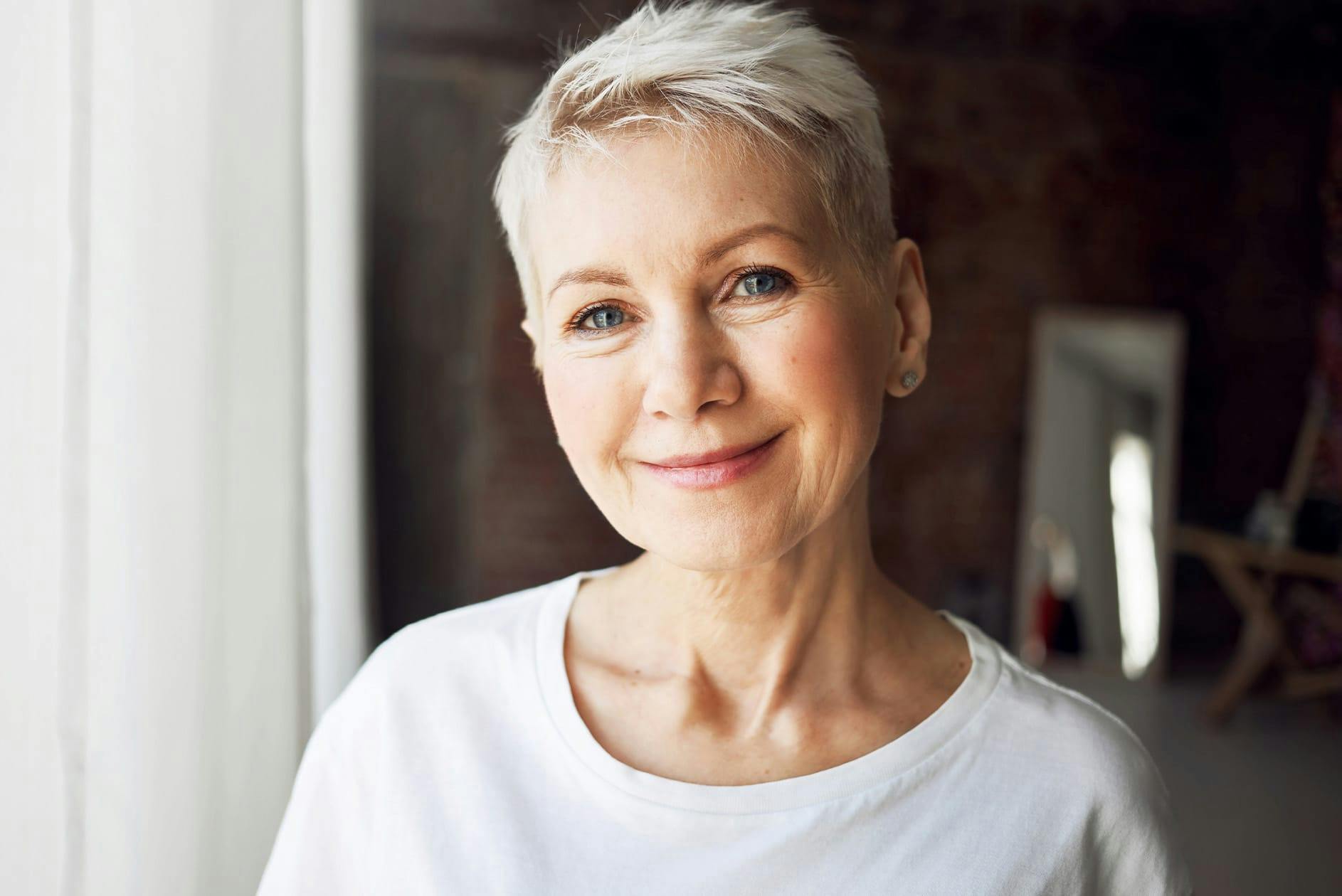 Short-haired woman smiling