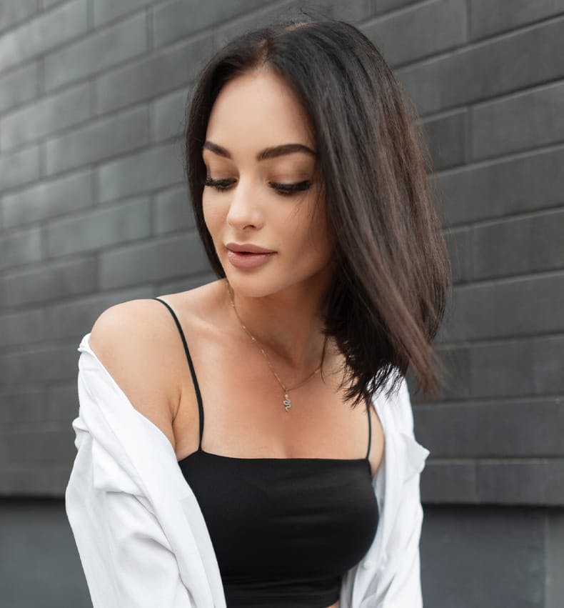 brunette in black top