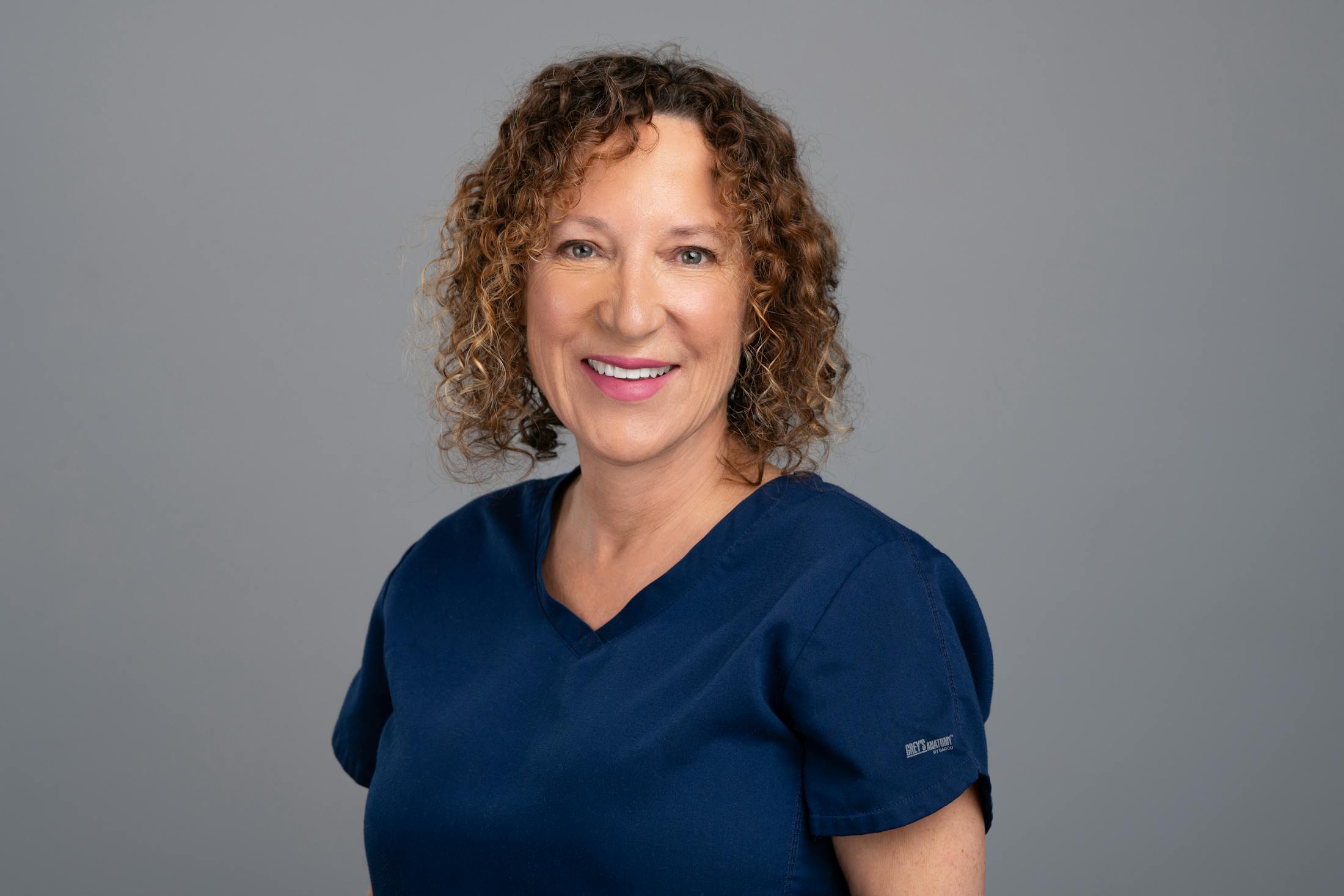 female doctor in scrubs