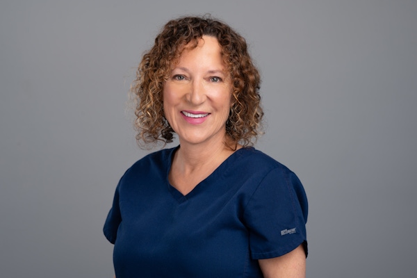 female doctor in scrubs