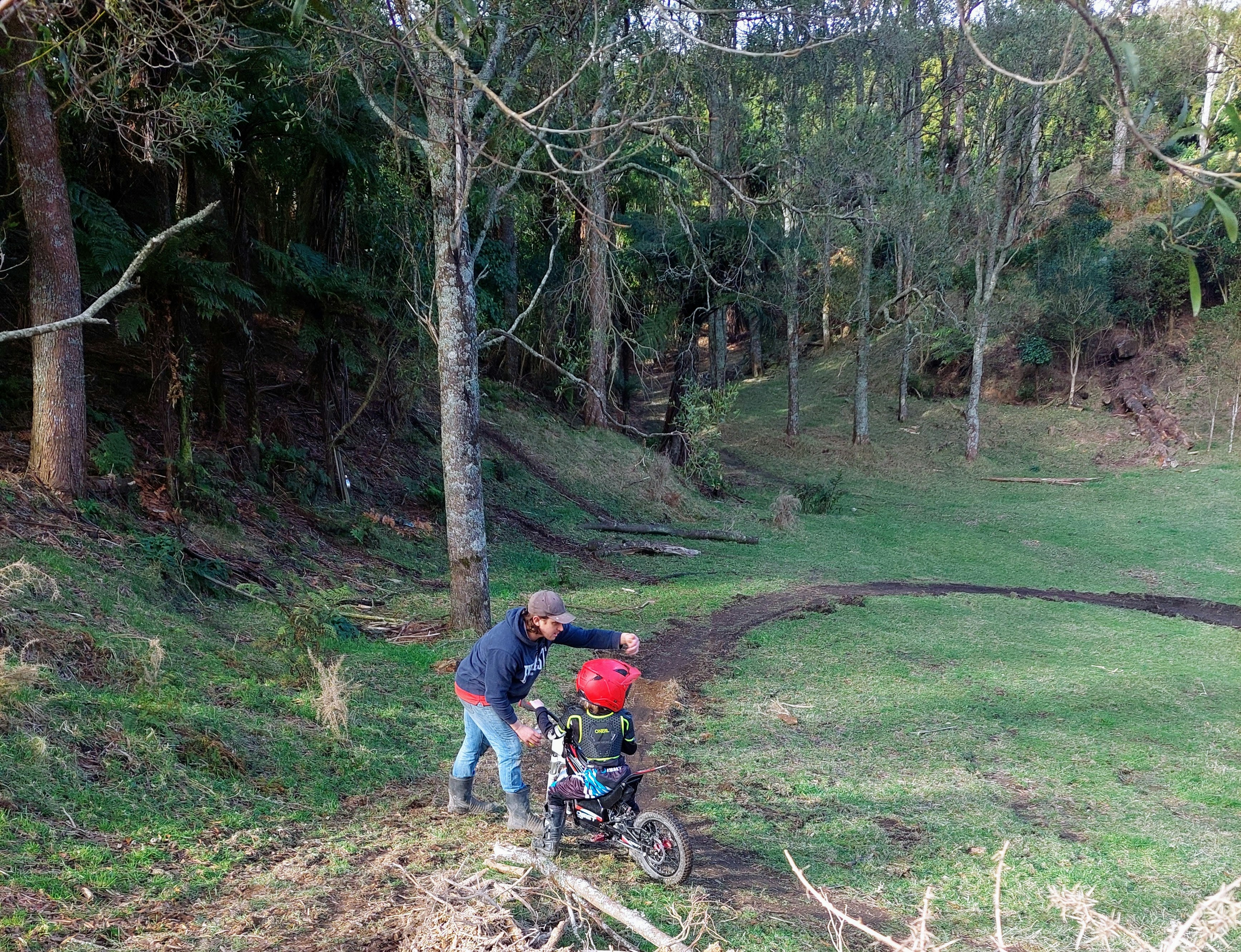 Phil Instructing junior rider on The Oval track