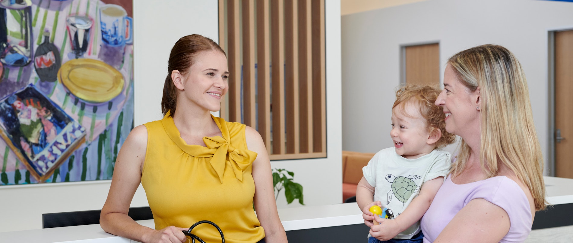 Patients and doctor in reception