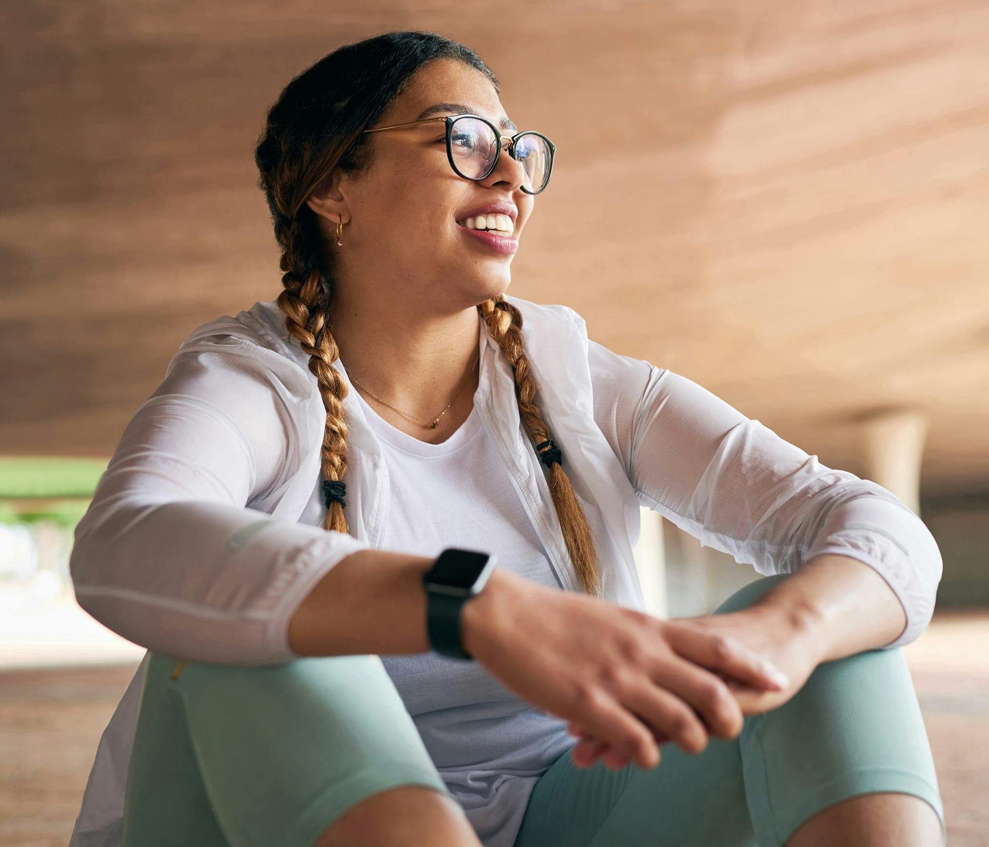 Woman sitting and smiling