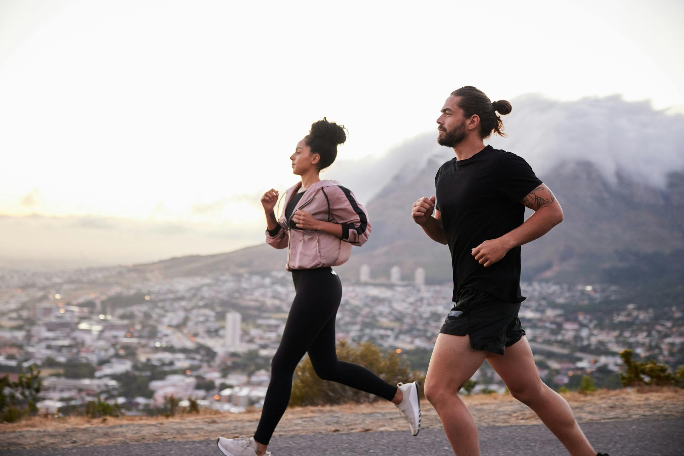 Couple jogging in mountains