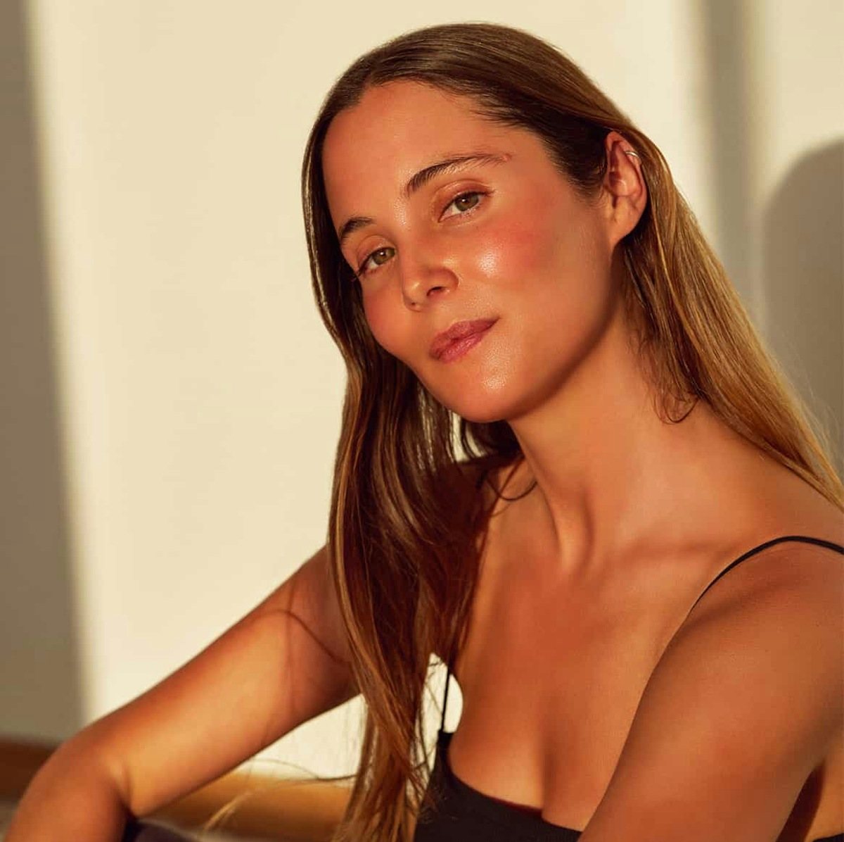 woman with long dark blonde hair