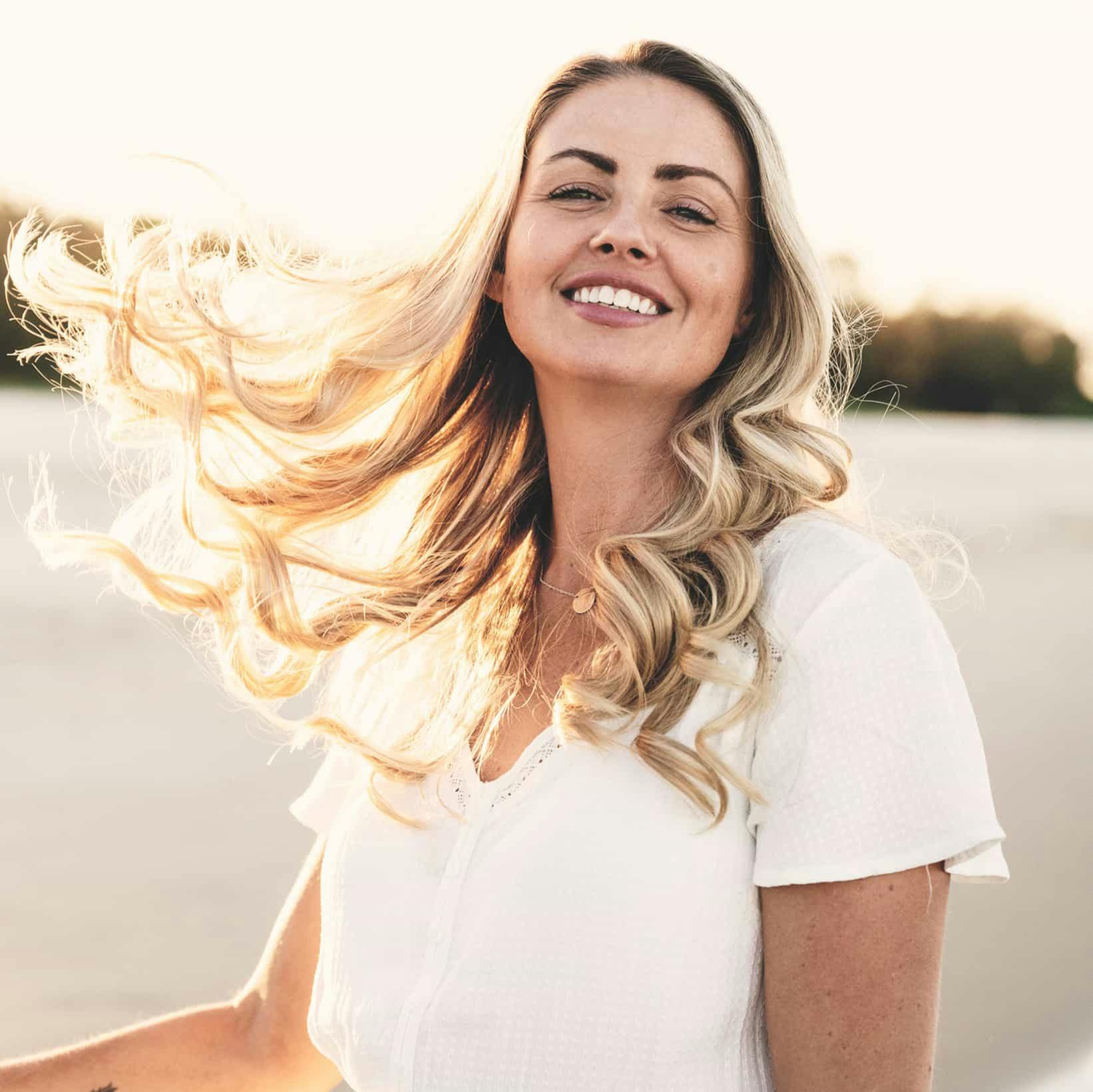 woman in a white top