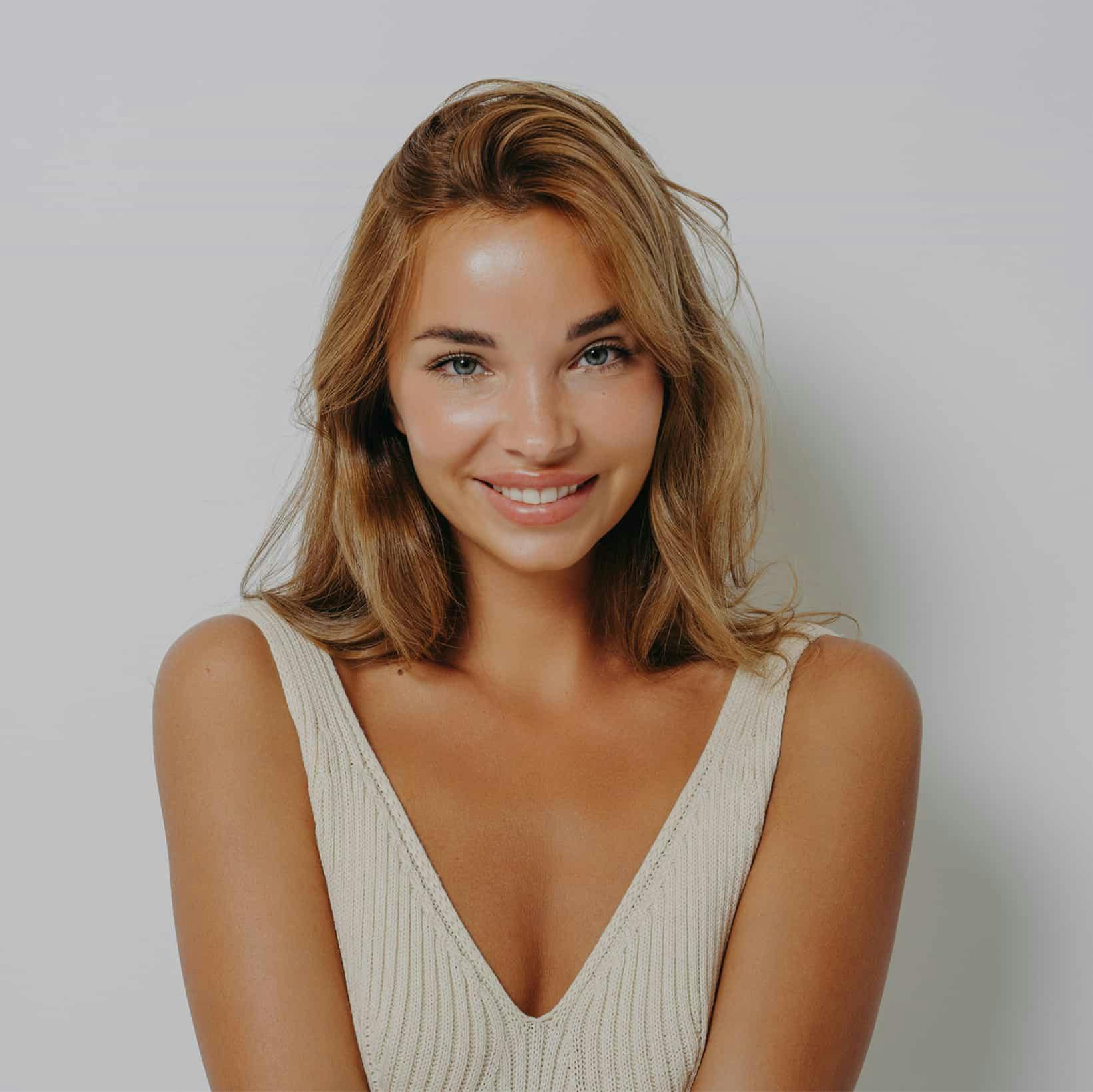 woman in a white top