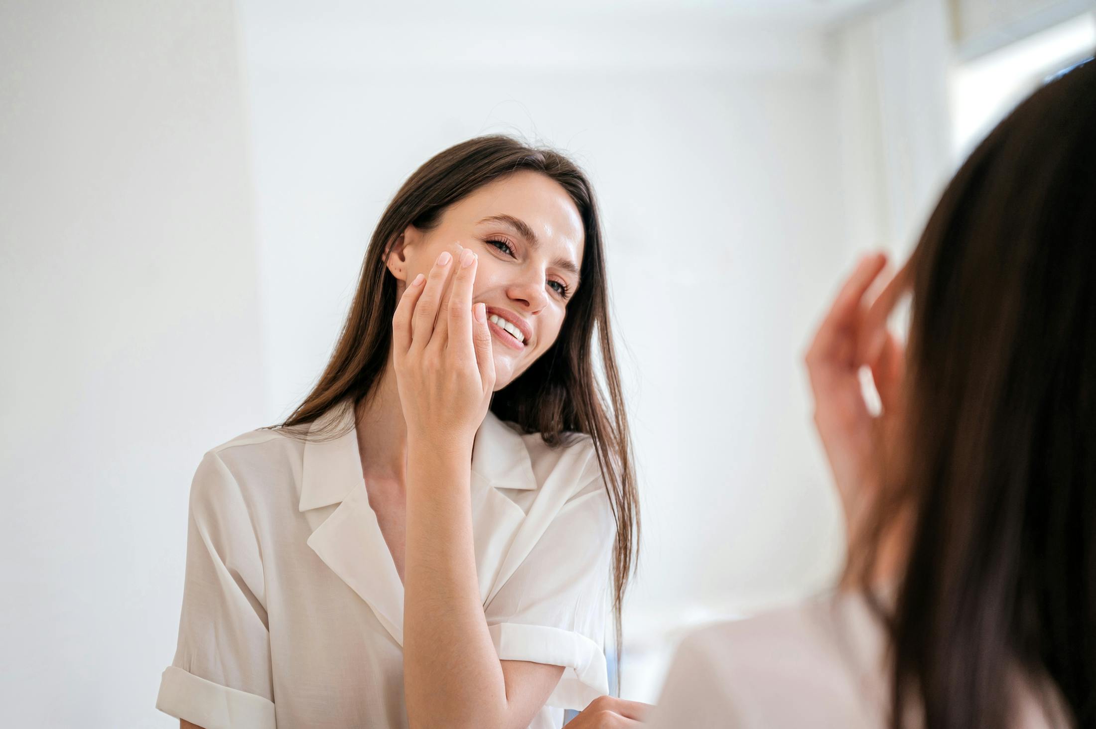 Woman looking in mirror